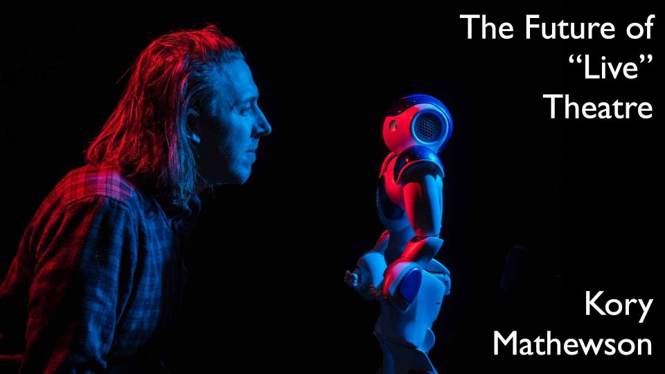 Artificial Intelligence researcher and Improvisation performer, Kory Mathewson and Blueberry the robot, on March 6, 2018.