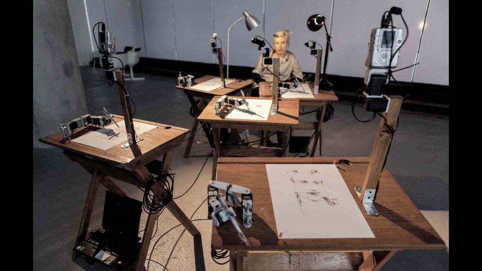 6 Robots Named Paul from Patrick Tresset and 5RNP drawing Nino on YouTube